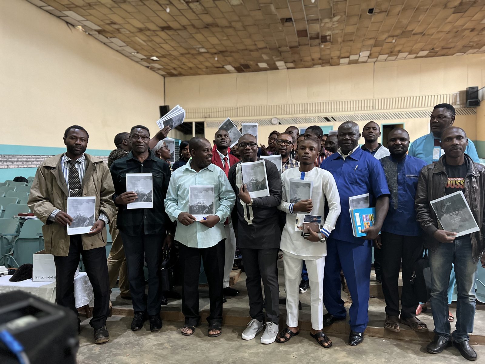 Graduates with their manuals