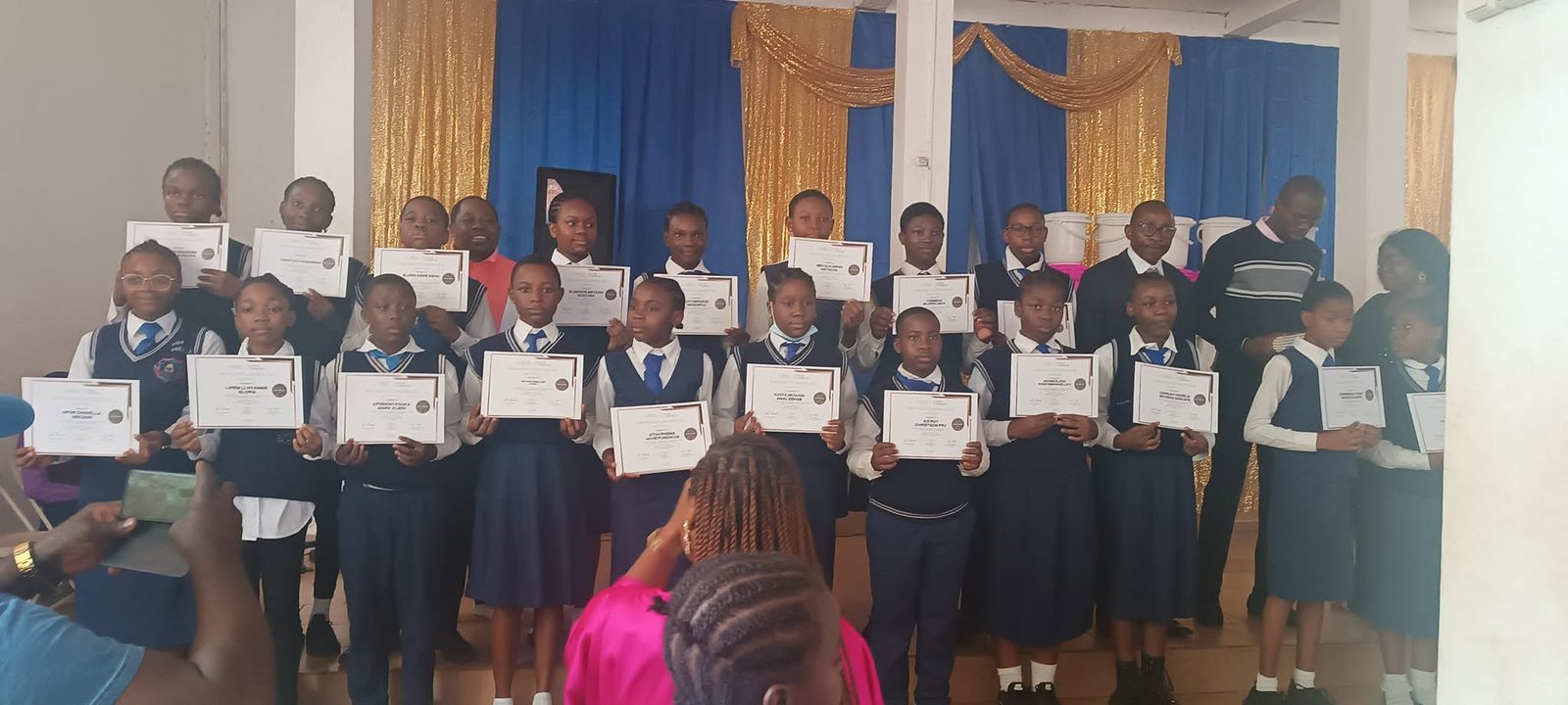 Students receiving certificates